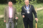 Pictured are Wealden District Council chairman Councillor Ron Reed with the council’s Green Spaces officer James Lord at the planting ceremonies.